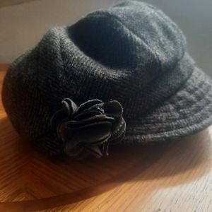 Wool hat from Ireland.  Never worn. Charcoal black/plaid New w/tag.